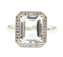 3.10 ctw White Emerald Cut Topaz & 0.18 ctw Round Diamond 14KT White Gold Ring