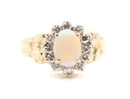 Women's 0.40 Ctw Oval Cabochon Opal & Round Diamond Halo 14KT Gold Nugget Ring
