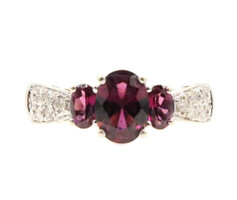 Three Stone Oval Cut Synthetic Ruby and Round Diamond 10KT White Gold Ring 3.4g