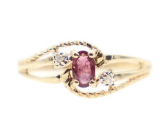 Estate 0.15 ctw Oval Cut Garnet & 0.02 ctw Round Diamond 10KT Yellow Gold Ring