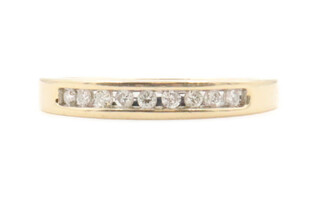 Women's 14KT Yellow Gold 0.20 ctw Round Diamond 3.3mm Channel Band Ring - 3.0g 