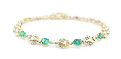 Women's Fancy 0.80 Ctw Oval Cut Emerald & Round Diamond 14KT Gold Bracelet 7"