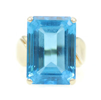Women's 19.0 Ct Emerald Cut Blue Topaz 10KT Yellow Gold Cocktail Ring by CGJ