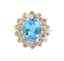 3.30 ctw Oval Blue Topaz 1.05 ctw Double Halo Round Diamond 14KT Gold Ring 6.8g