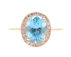 Women's 2.35 Ct Oval Blue Topaz & Diamond Halo 14KT Rose Gold Engagement Ring