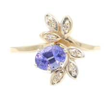 0.60 ctw Oval Cut Tanzanite & 0.07 ctw Round Diamond Floral 14KT Gold Ring 2.6g