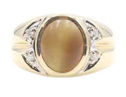 2.40 ctw Oval Cabochon Tiger Eye & 0.12 ctw Round Diamond 10KT Gold Estate Ring