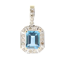 2.25 ctw Emerald Cut Blue Topaz & 0.45 ctw Round Diamond 14KT Gold Pendant 