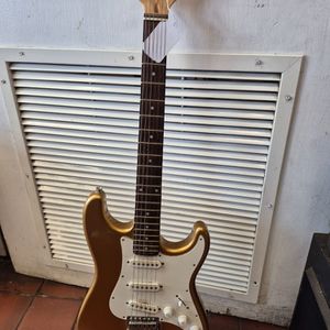 AUSTIN ELECTRIC GUITAR GOLD 