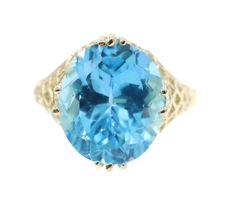 Women's Solitaire 8.70 Ct Oval Blue Topaz 10KT Yellow Gold Filigree Ring 4.39g